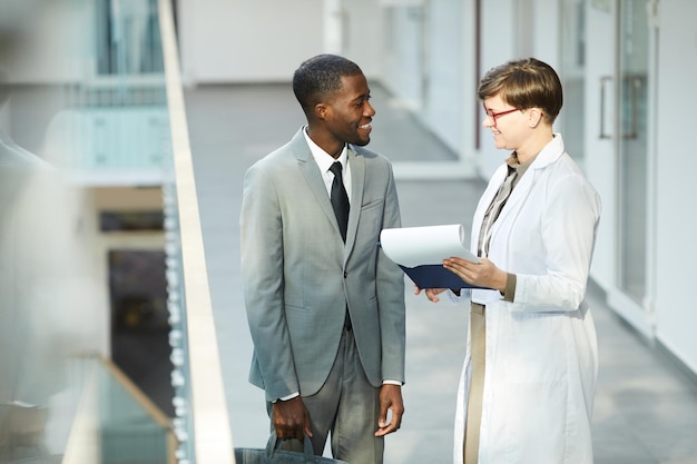 Two Smiling Business Colleagues Minimal