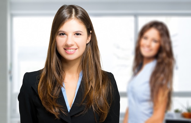 Two smiling businesswomen