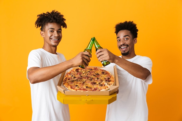 Two smiling male friends in t-shirts