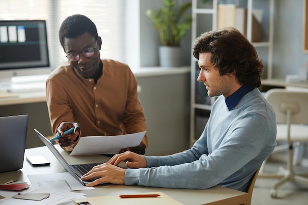 Two software developers in office