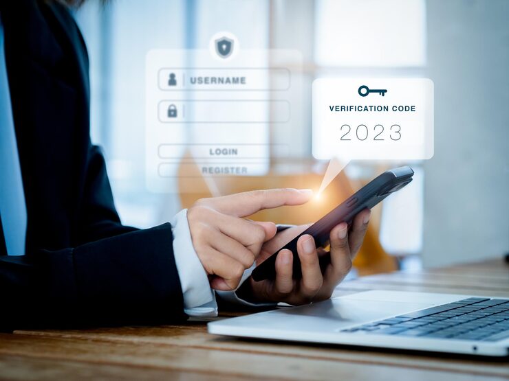 Photo two steps authentication 2fa concept 2023 verification code and key icon alert on smart phone while using computer for validate password page identity verification cyber security technology