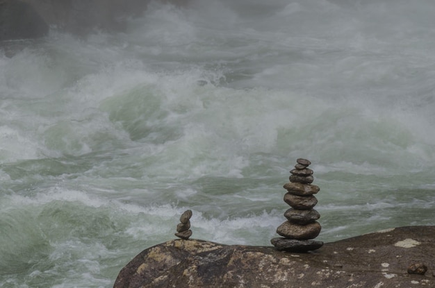 Two stone towers in nature