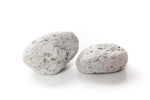 Foto due pietre su uno sfondo bianco