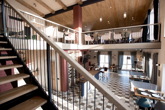 Two-storey restaurant in rustic style