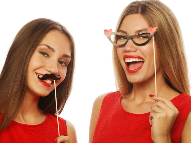 Two stylish sexy girls best friends ready for party