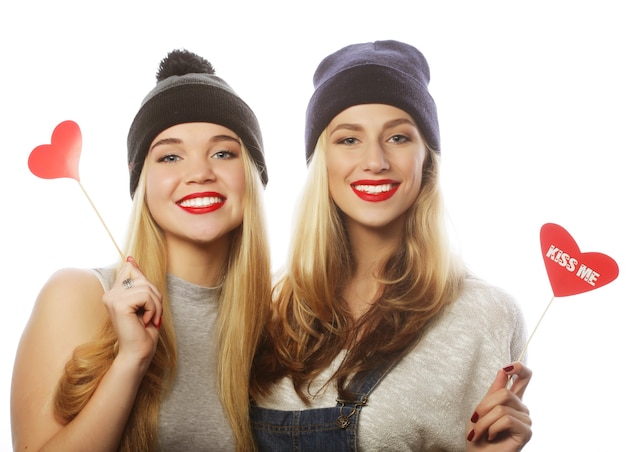 Two stylish sexy hipster girls best friends ready for party