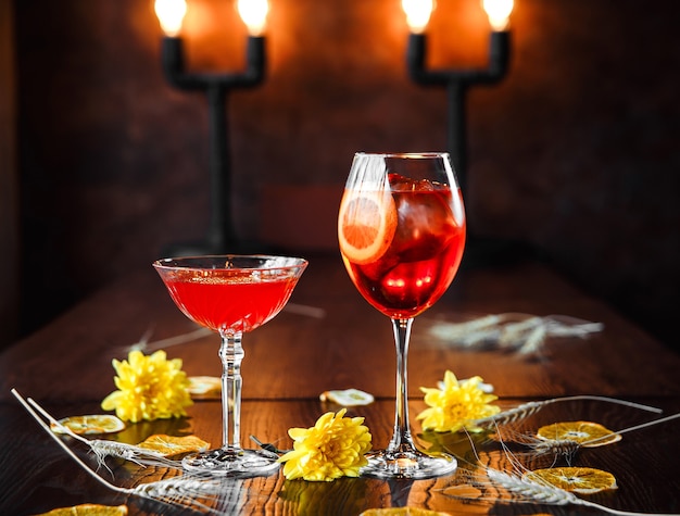 Two sweet cocktails on the decorated background
