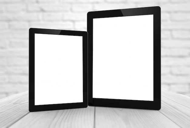 Two tablets with different sizes and blank screen