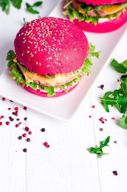 Two tasty hamburgers with little American flags