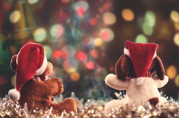 Two teddy bears enjoying Christmas and New Year Eve New Year celebration concept