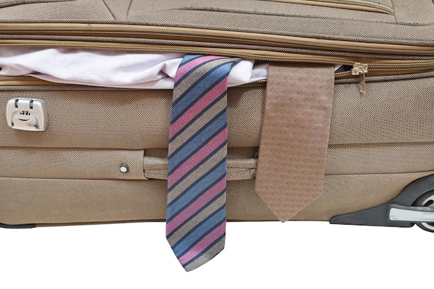 Two ties from ajar suitcase