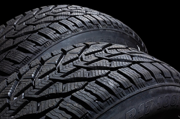 two tires on gray background