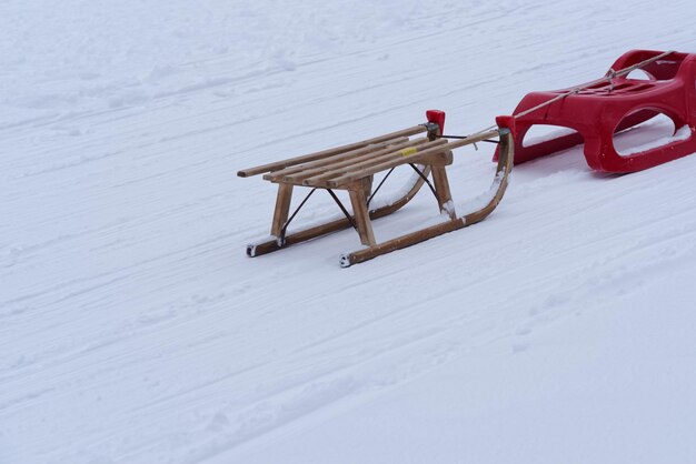 Photo two toboggan sleds in a winter