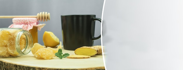 Two types of ginger fresh and candied on a rustic table