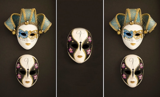 Two venetian carnival masks on the black surface. Location vertical.