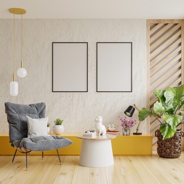 Два вертикально оформленных макета плаката на пустой белой стене в декоре гостиной с креслом. 3d-рендеринг