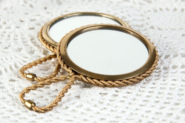 Two vintage brass hand mirror 