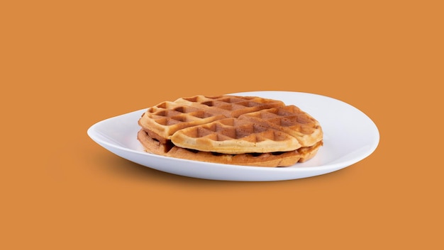 two waffles on white plate