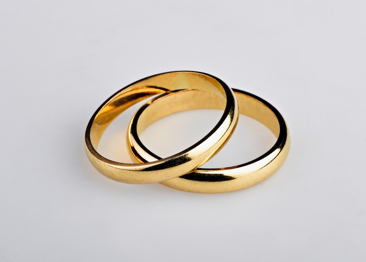 Photo two well used golden wedding rings
