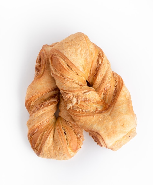 Two wheat bread on white, top view