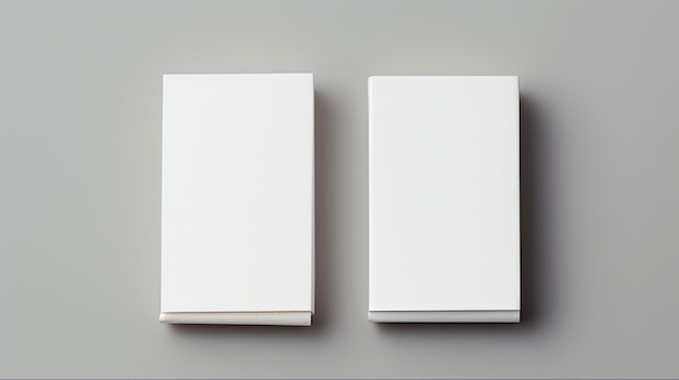 Photo two white blank matchbooks for advertising copy front and back views with closed stapes and