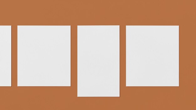 Photo two white blank square pieces on a brown background