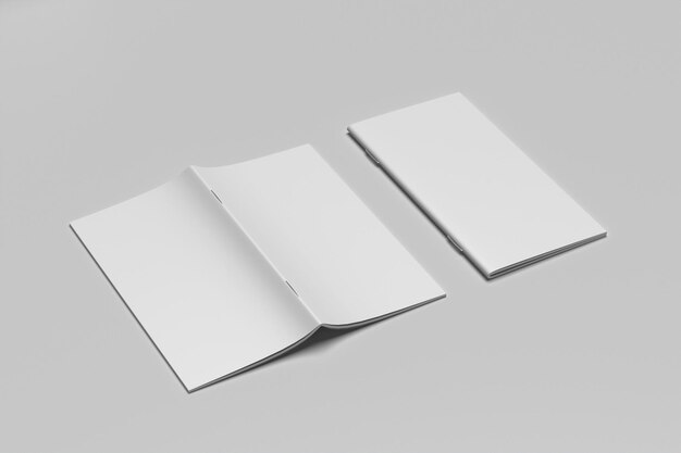 two white folded paper folded in half and one is white