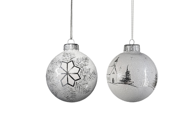 Two white glass Christmas balls on a white background Christmas decorations soft focus