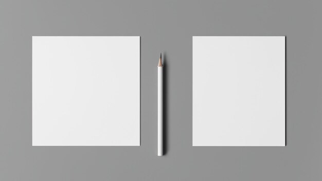 Two white pieces of paper with one being drawn on the bottom.