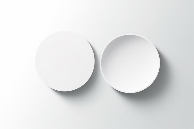 Photo two white plates with shadows on a gray background ai generative