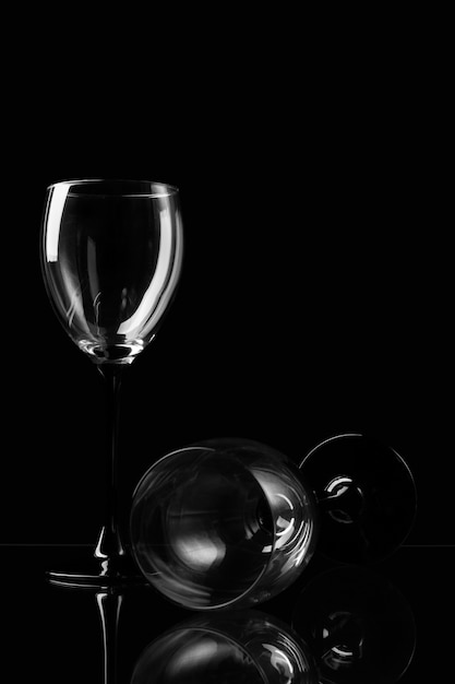 Two wineglass on dark