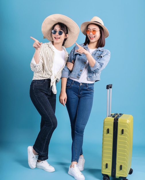 Two women on blue background