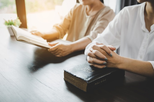 Two women praying worship believe