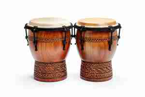 Photo two wooden drums with black straps bongo drums isolated on a white background