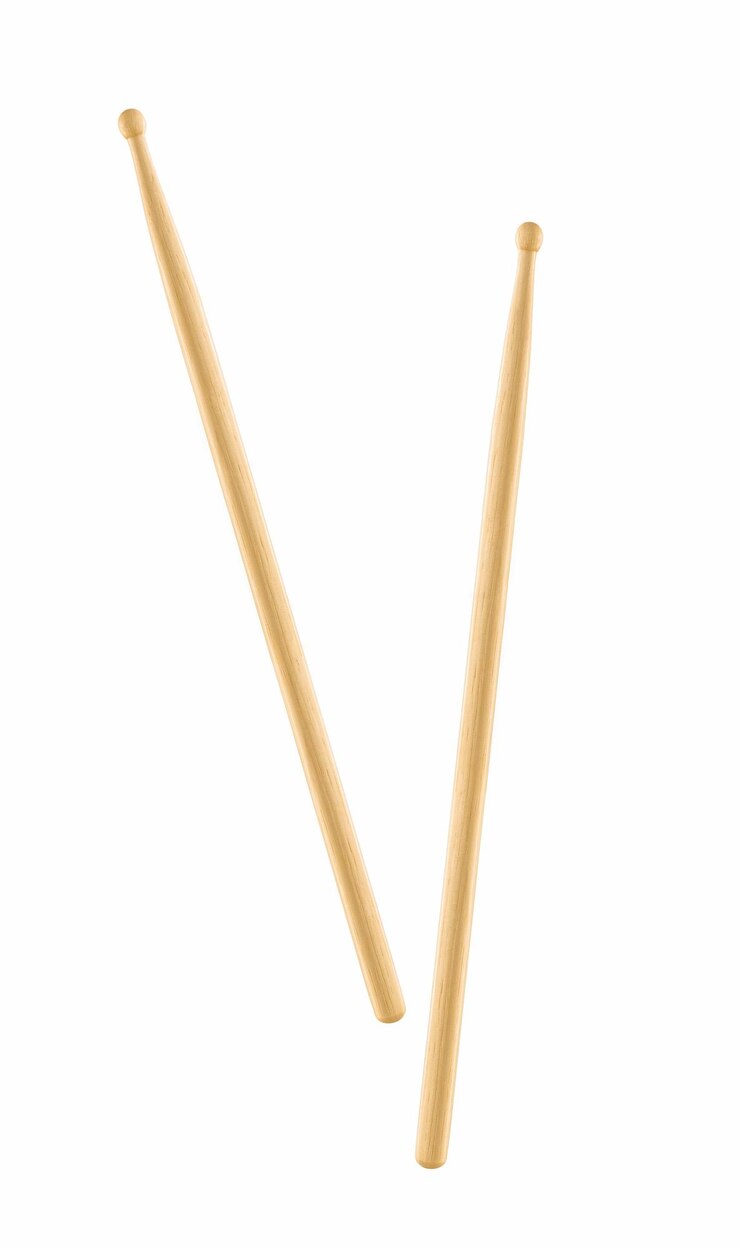 Photo two wooden drumsticks isolated
