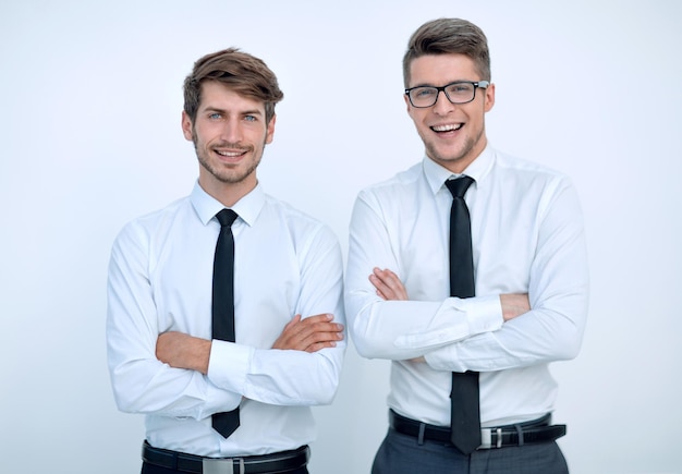 Two young beautiful men smiling with arms crossed