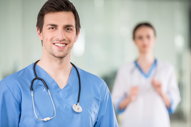 Two young doctors at doctor's office.