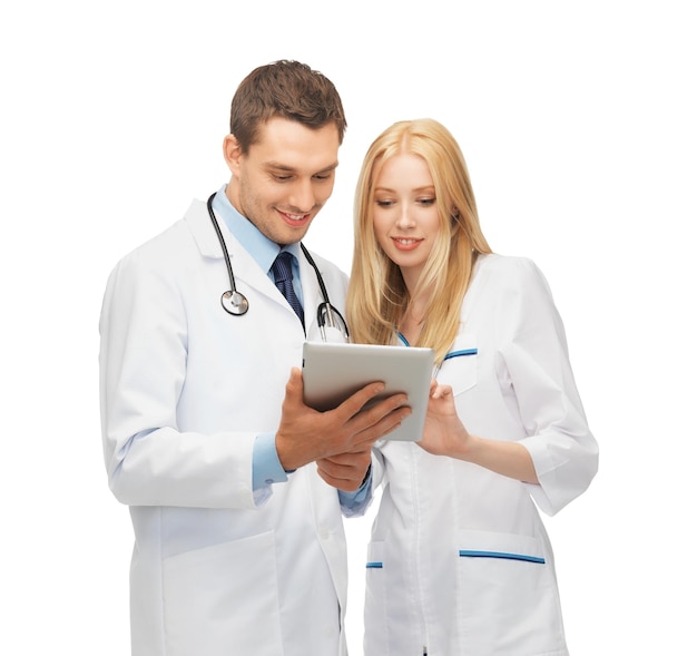 two young doctors working with tablet pc