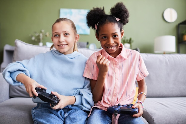 Two Young Girls Playing Video Games