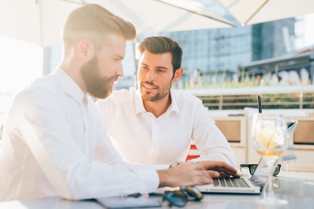 Two young handsome modern businessman