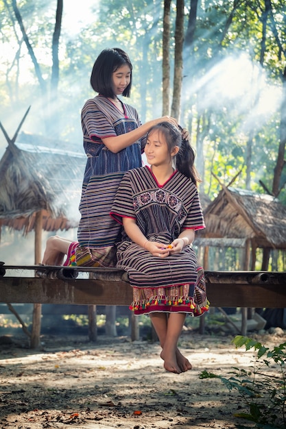 Two young karen children smiled and play 