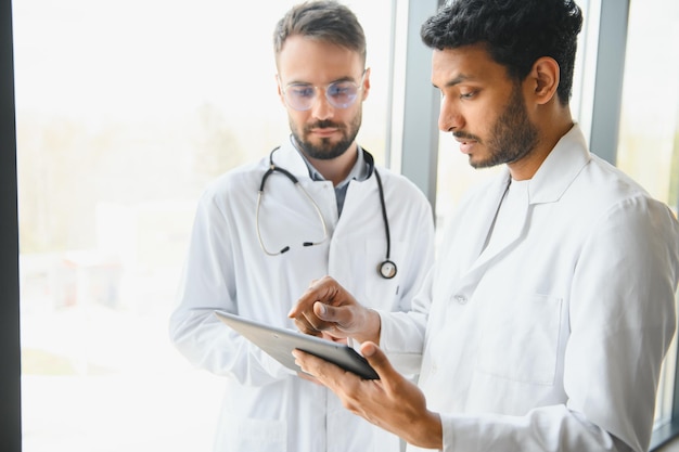 Two young male doctors in the clinic