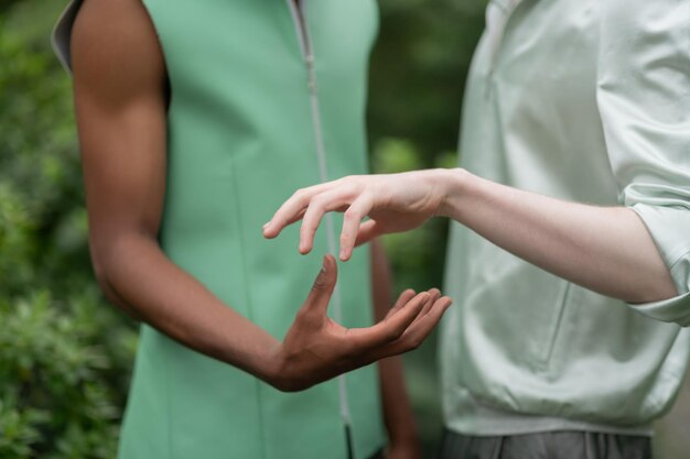 Two young men of different nationality posing for social campaign