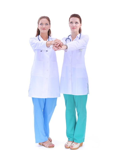 Two young woman doctor standing in hospital Two young woman doctor