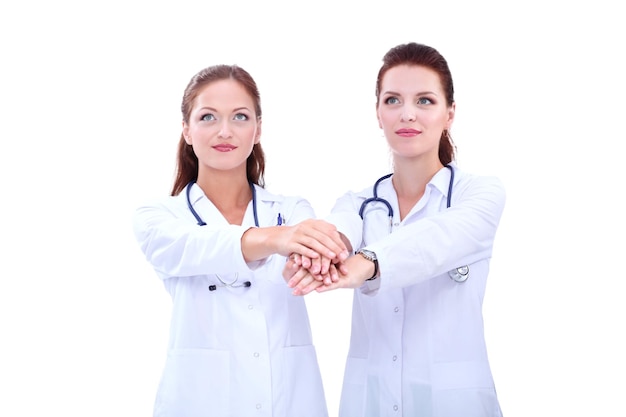 Two young woman doctor standing in hospital two young woman doctor