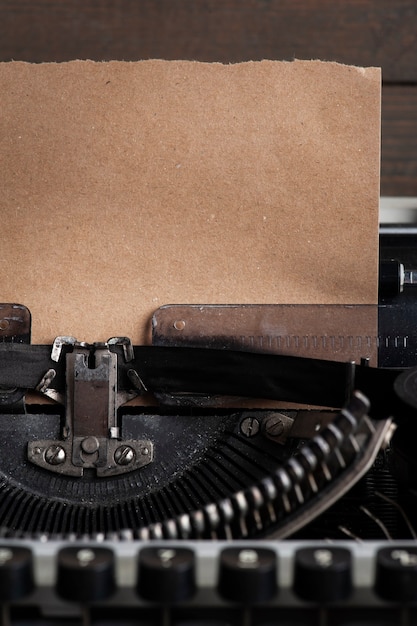 Typewriter close up and kraft paper