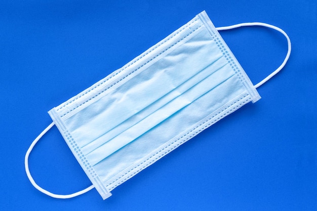 Typical 3 ply surgical face mask with rubber ear straps