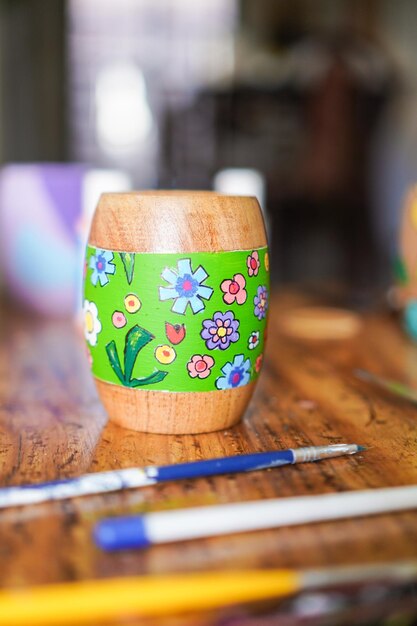 Photo typical argentinian mate with handpainted coloured flowers