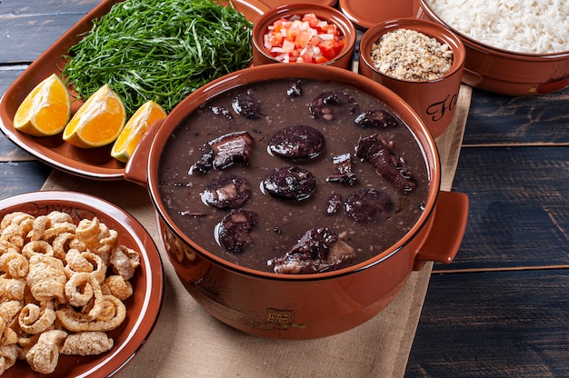 Photo typical brazilian dish called feijoada. made with black beans, pork and sausage