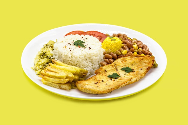 Typical brazilian meal traditional brazilian lunch rice and beans farofa fries tomato and salad with fried sausage